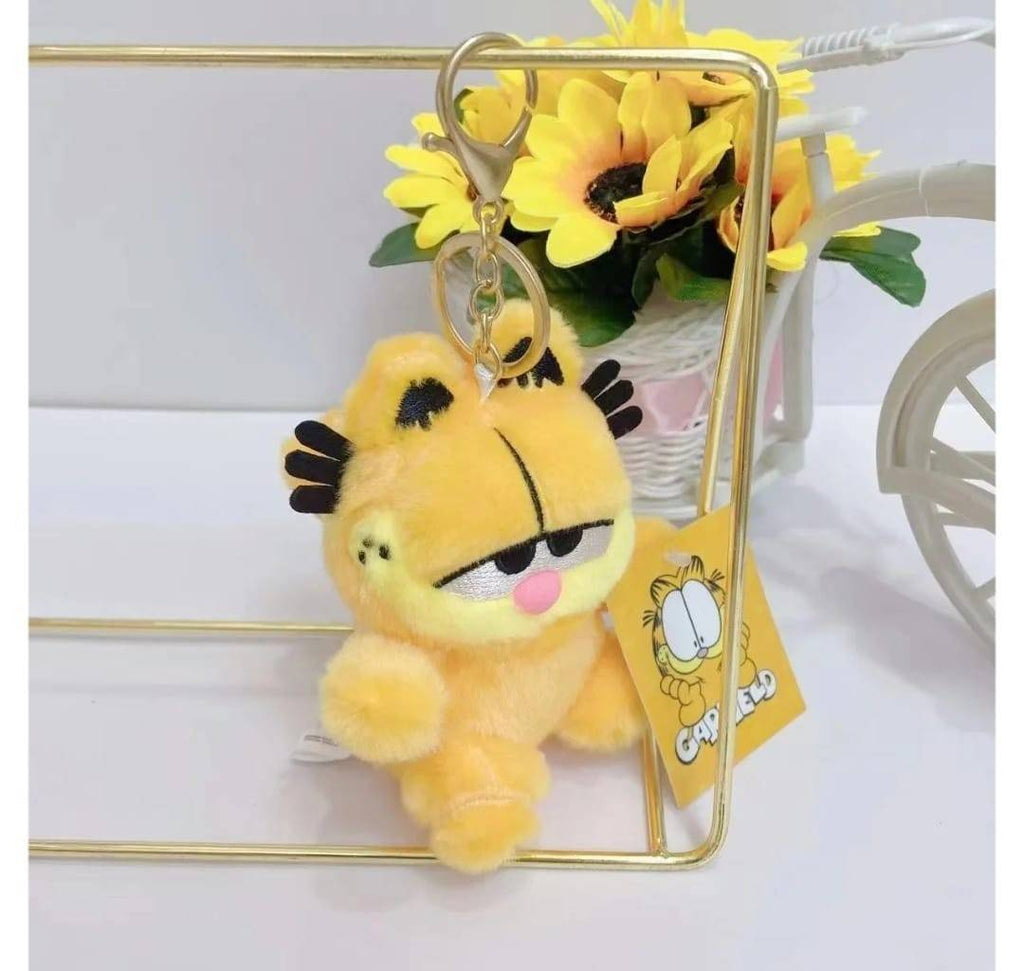 Jucarie de plus, Garfield, tip breloc, galben inchis, 12 cm