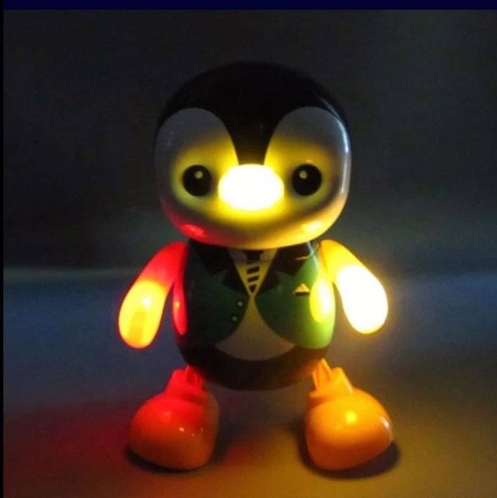 Jucarie interactiva si distractiva, Pinguinul dansator