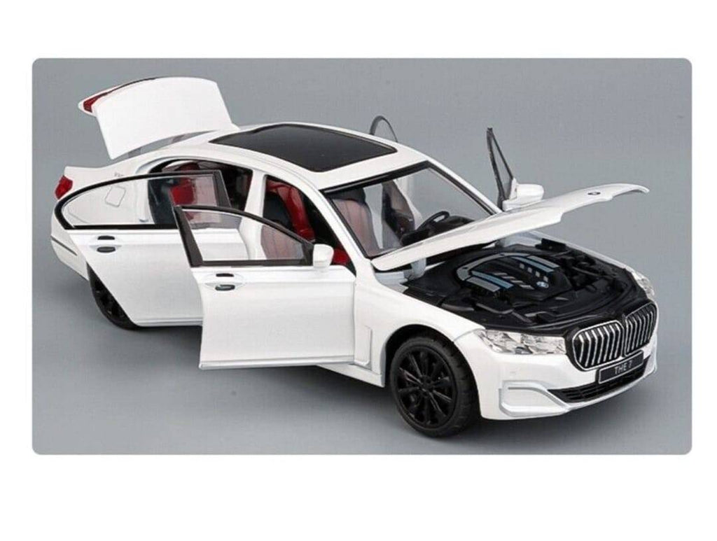Masinuta metalica mecanica, tip BMW seria 7, lumini si sunete, usi mobile, capota mobila, portbagajul mobil, alb, 20 cm