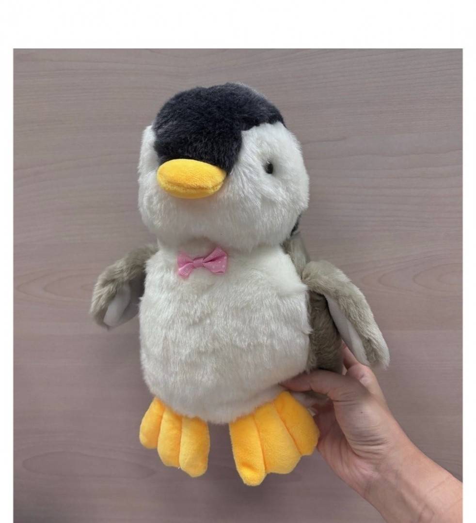 Pinguin de plus, realist, gri/ galben 20 cm